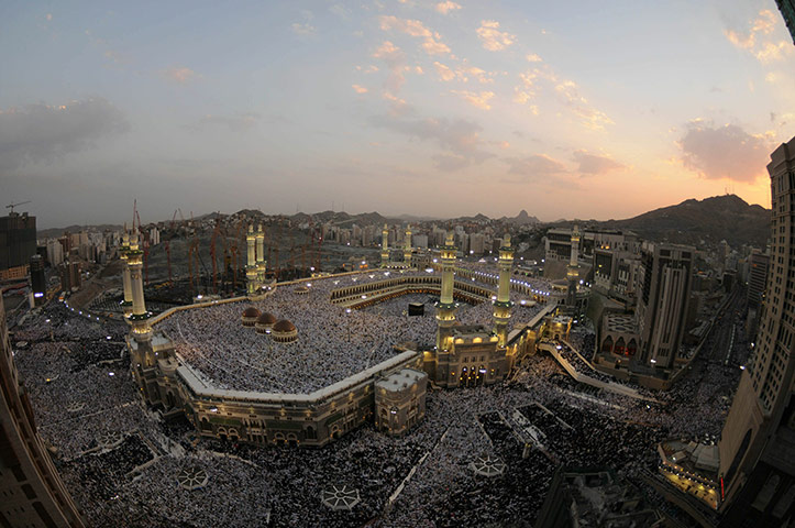 Eid begins: Muslims perform the early morning Eid Al-Fitr prayer in Mecca 