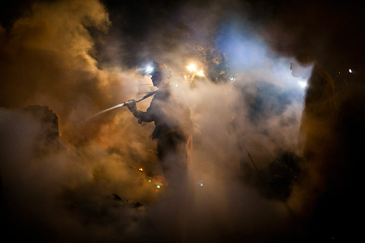 24 hours in pictures:  Firefirefighters work to contain fire in San Bruno