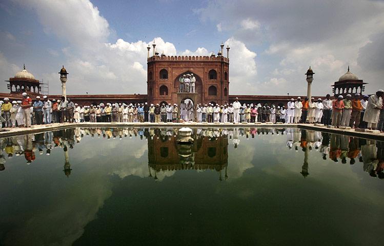 Eid festival: Muslims offer prayers at the Jama Masjid mosque in New Delhi, India