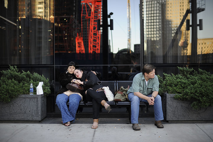 World Trade: People look at the World Trade Center site on the ninth anniversary