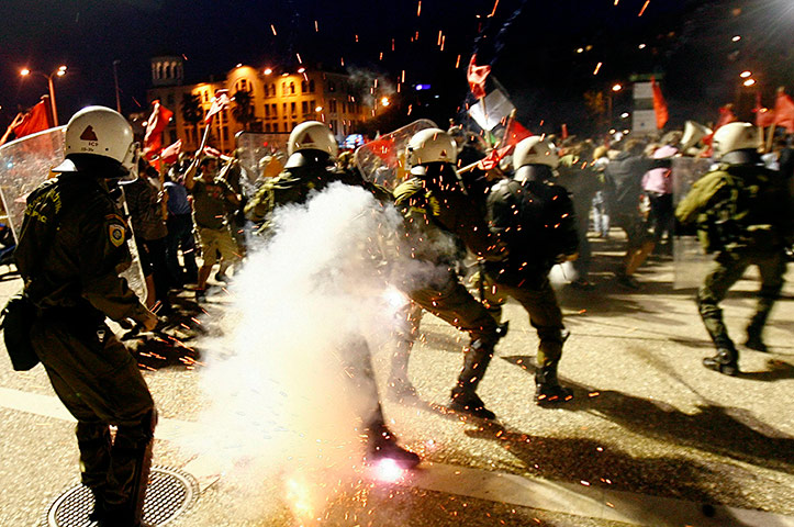 24 hours in pictures: Riot police clash with protesters in Thessaloniki, Greece 