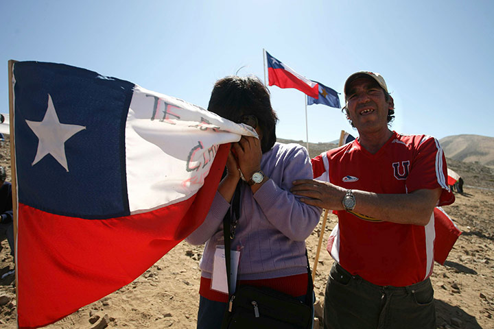 Trapped miners in Chile: 5 September: Margarita Lagos cries during a ceremony on the 30th day 
