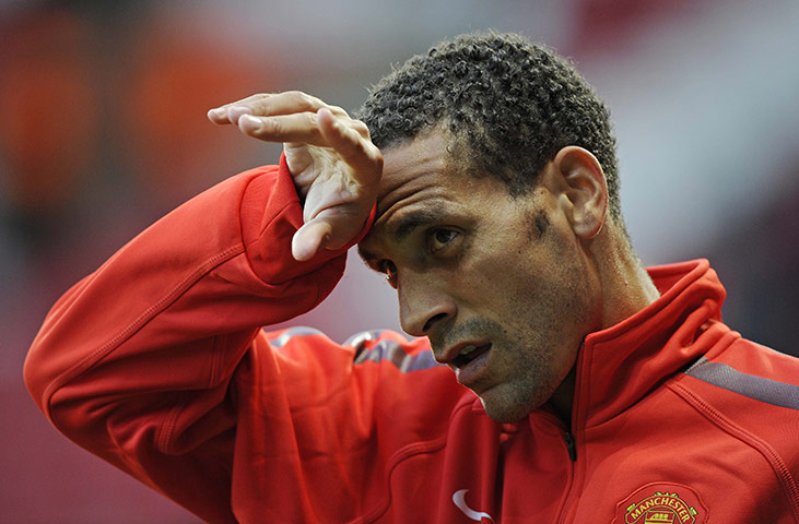 Man Utd v Rangers: Rio Ferdinand warms up ahead of his return to the first-team