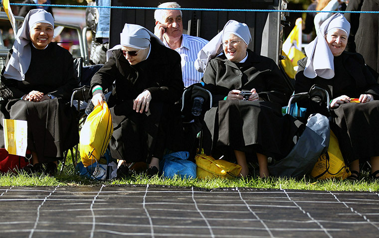 Pope day one: Pilgrims gather ahead of the arrival of Pope Benedict