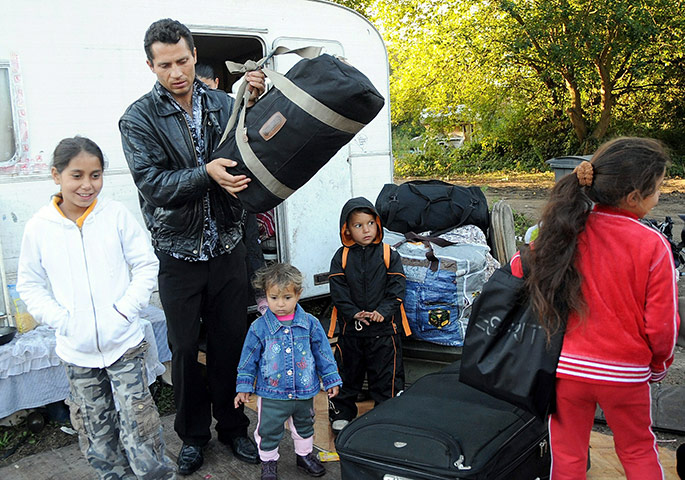 Roma Return : People belonging to the Roma community carry luggages to Lesquin airport