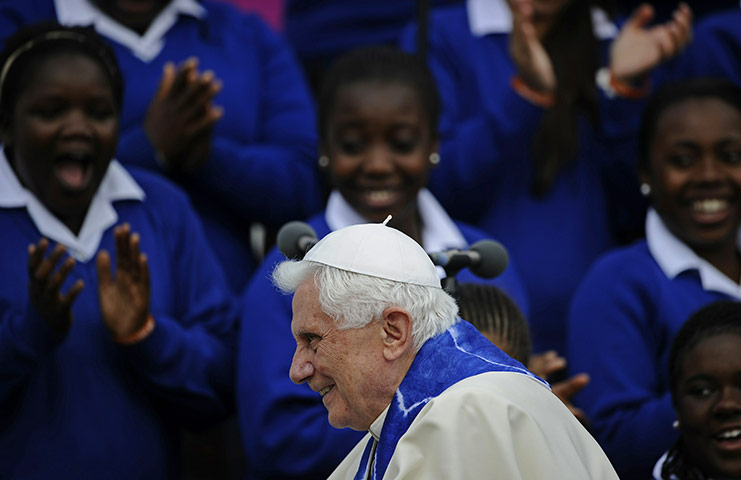 Pope Day 2 Twick: Pope Benedict XVI smiles during a tour in Twickenham