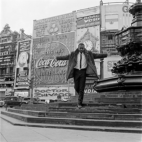 James Barnor Photographs: Mike Eghan at Piccadilly Circus, London, 1967, by James Barnor