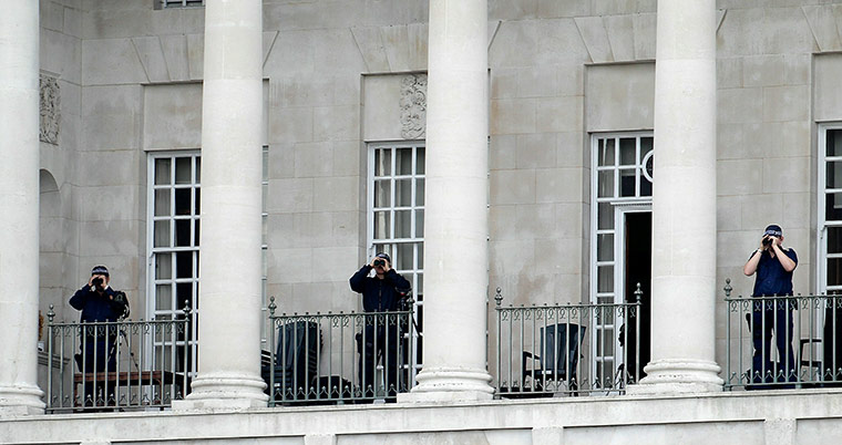 Pope 3: Police surveillance teams monitor the area around 