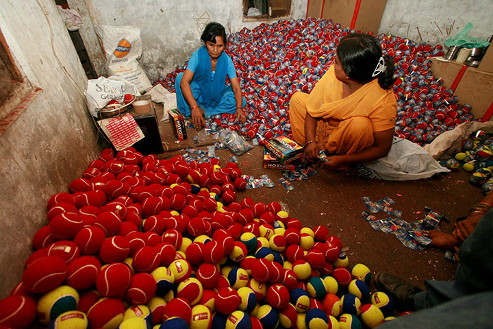 Commonwealth Games Labour: Employees prepare balls in a factory workshop in Jalandhar