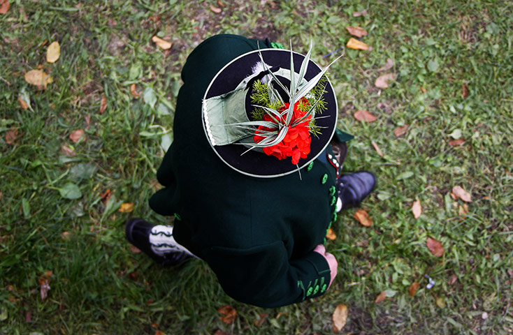 24 Hours in Pictures: A Bavarian mountain rifleman during the opening ceremony of the Oktoberfest