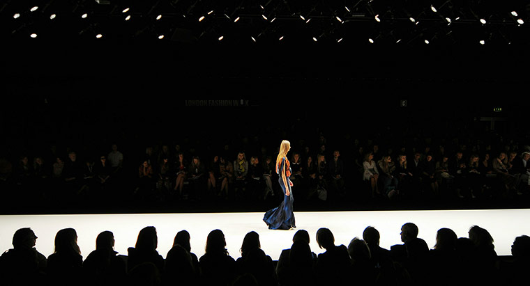 24 Hours in Pictures: A model walks down the catwalk presenting a creation by Maria Grachvogel