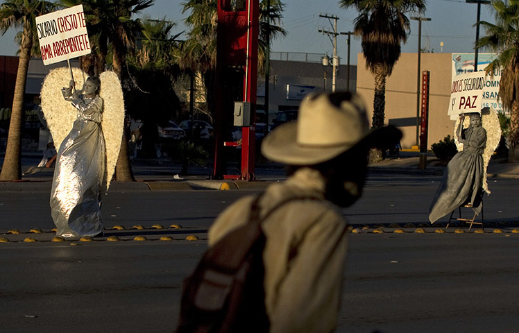 24 hours in pictures: demonstration against violence in Ciudad Juarez , Mexico