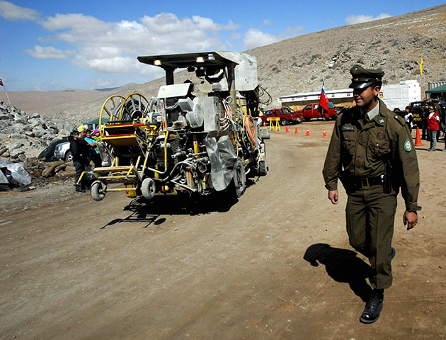 Chile Miners Update: A drilling machine crosses the encampment to work in the rescue operation