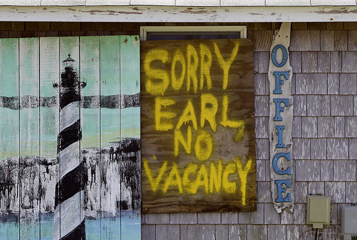 Hurricane Earl: A window is boarded up with a message for Hurricane Earl