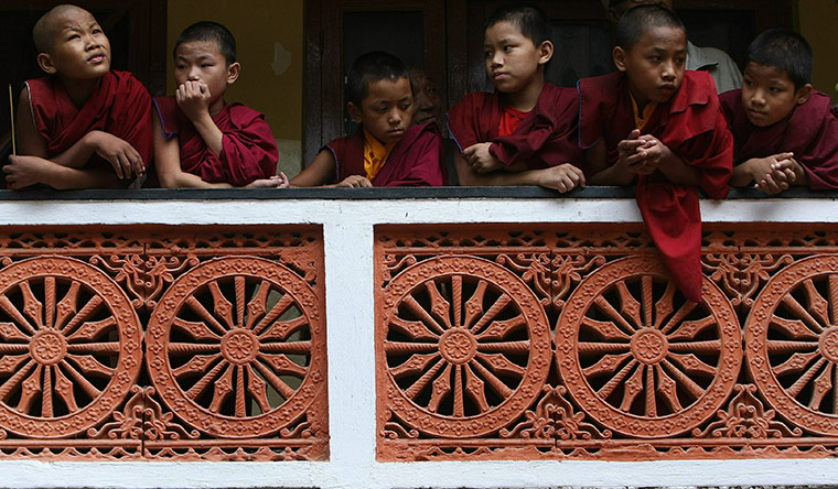 Tibetan Democracy Day: Young Tibetan Buddhist children watch the ceremony on Tibetan Democracy Day