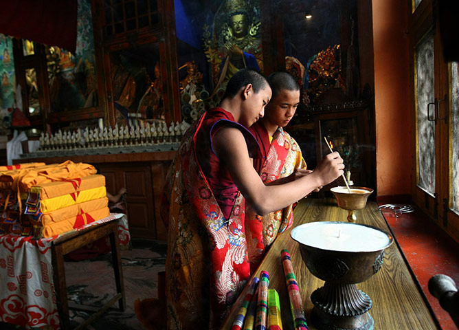 Tibetan Democracy Day: Tibetan-in-exile monks prepare for a ceremony on 50th Tibetan Democracy Day