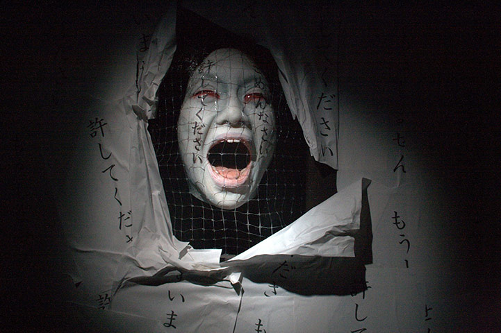 24 hours: Tokyo , Japan: A ghost figure at a haunted house