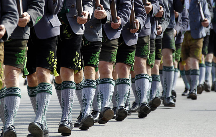 Oktoberfest in Munich: Bavarian riflemen march in traditional costume in the riflemen's procession