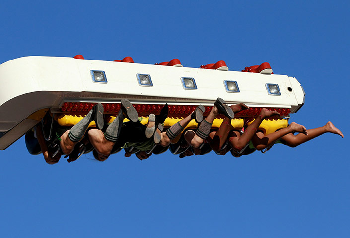 Oktoberfest in Munich: Visitors ride a fun ride during day two of the Oktoberfest 