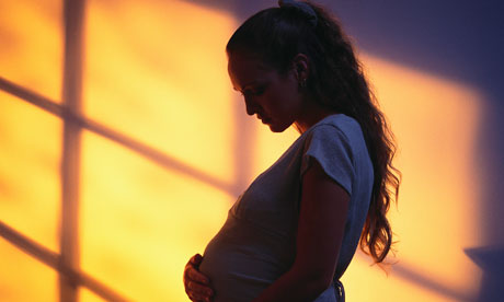 Pregnant Teen in Shadows