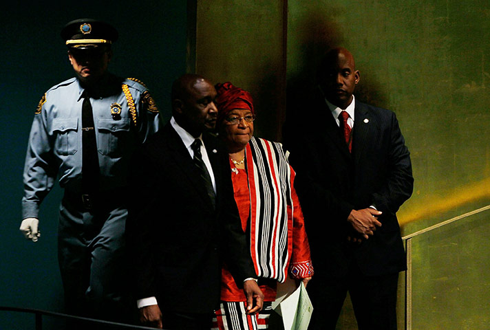 Millennium Development: Liberian president Ellen Johnson Sirleaf, second right, is escorted in 