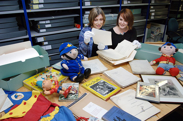 Sarah Lawrance  and Alison Coapes look through the Blyton archive
