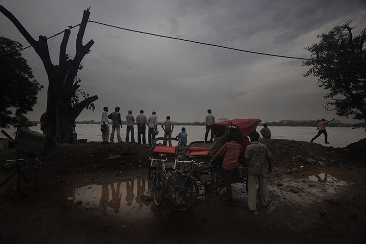 24 hours in pictures: heavy monsoon rains in india