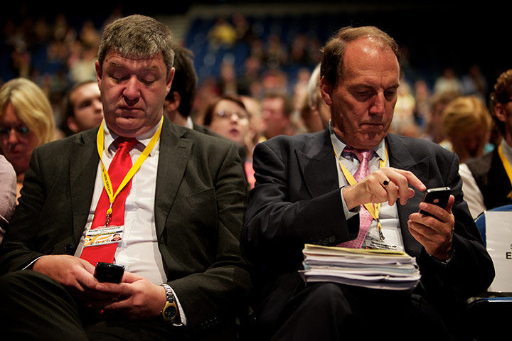 Thomond Liberal Democrats: MPs Alistair Carmichael and Simon Hughes check their phones
