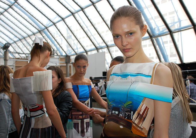 Mary Katrantzou: A model poses for photographs before the show