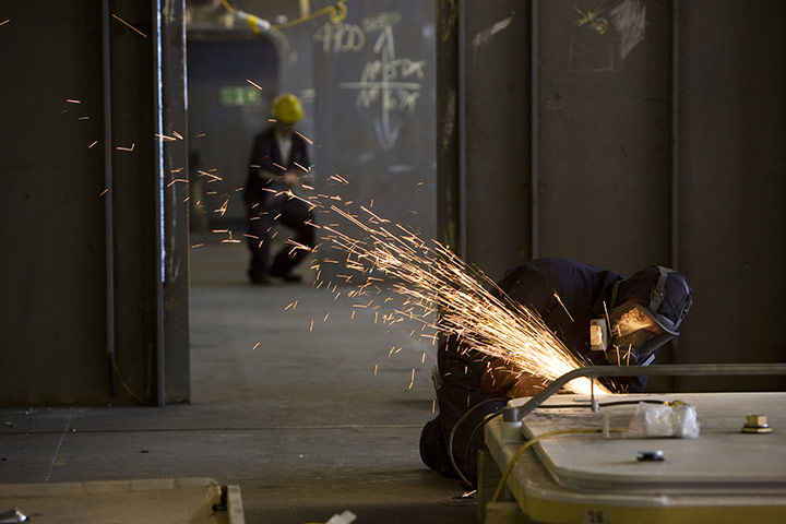 BAE Systems Govan: A fabricator using a grinder