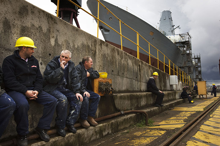 BAE Systems Govan: Workers on their lunch break near Type 45 Destroyer HMS Duncan