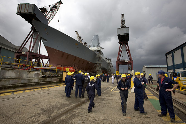 BAE Systems Govan: Workers on their lunch break near Type 45 Destroyer HMS Duncan 