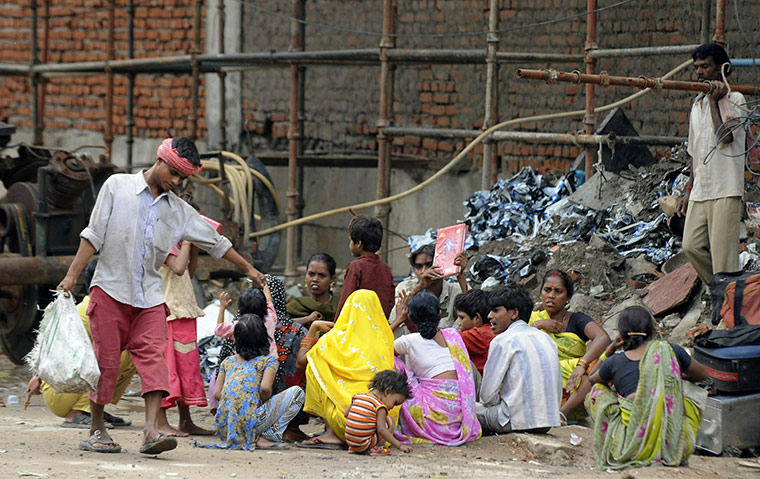 Commonwealth 2: Indian labourers and their children rest