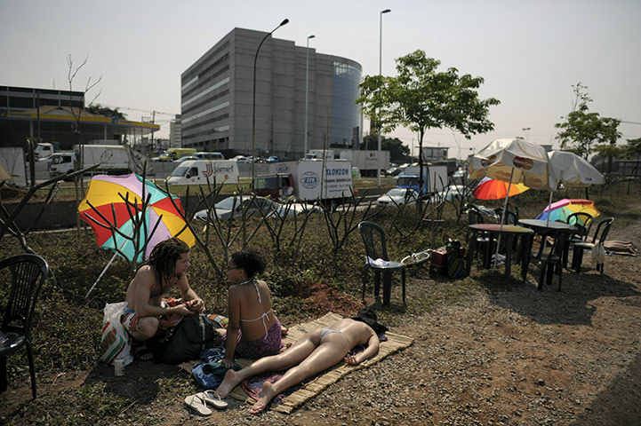 24 hours in pictures: Activists of environmental group  protest in Sao Paulo, Brazil