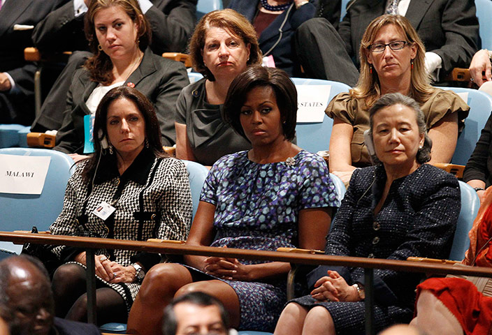 United Nations Summit: Michelle Obama listens as President Obama speaks at the 65th UNGA