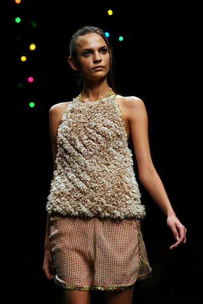 Milan Fashion Day 3: A model displays a creation as part of Kristia Ti SS2011