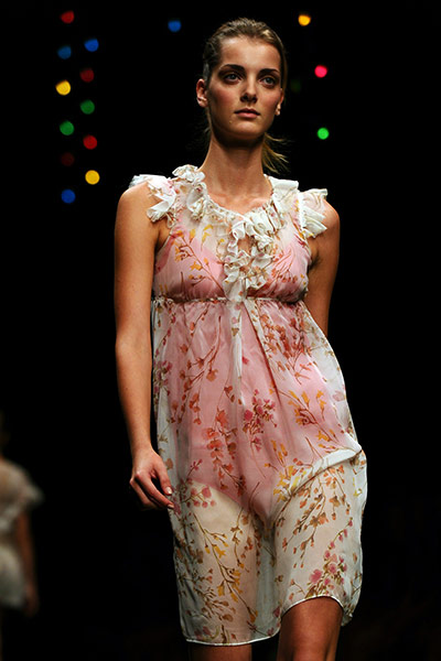 Milan Fashion Day 3: A model displays a creation as part of Kristia Ti SS2011