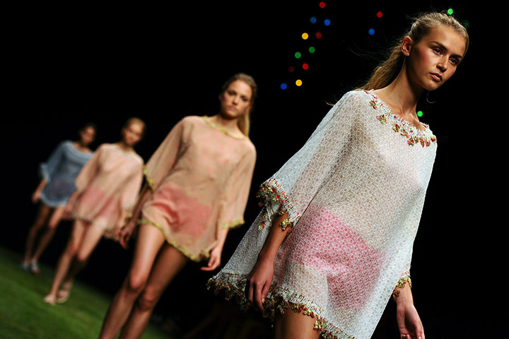 Milan Fashion Day 3: Models display creations as part of Kristine Ti SS2011