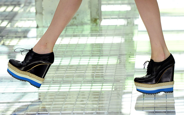 Milan Day 2 Update: A model displays a creation as part of Prada SS2011