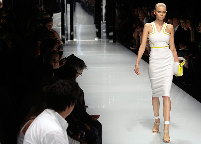 Milan Day 3 Update: A model presents a creation as part of Versace's Spring/Summer 2011