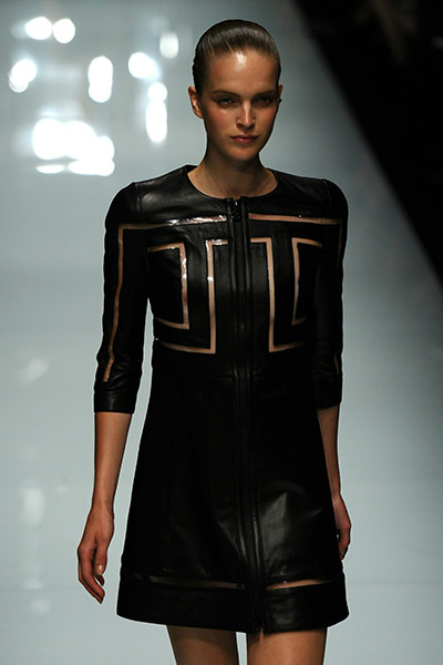 Milan Day 3 Update: A model displays a creation as part of Versace SS2011