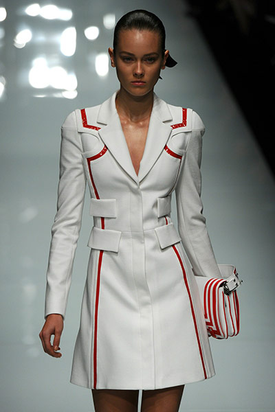 Milan Day 3 Update: A model displays a creation as part of Versace SS2011