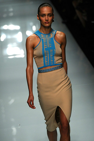 Milan Day 3 Update: A model displays a creation as part of Versace SS2011