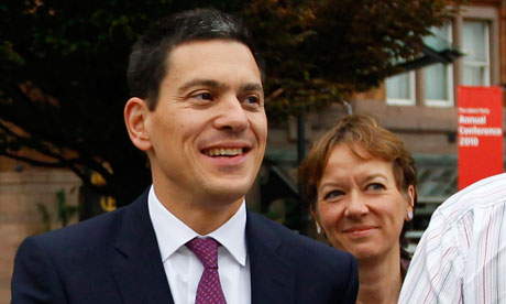 David Miliband arrives at the Labour party conference with his wife.