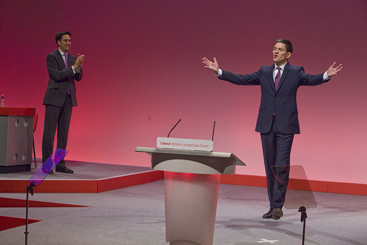 Labour party conference: Labour Party leader Ed Miliband, left, applauds his brother David onstage