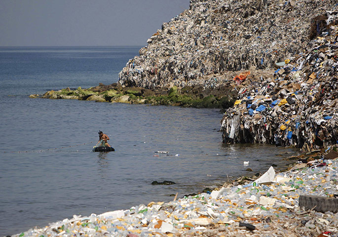 24 hours: A rubbish dump on the Sidon seafront in south Lebanon