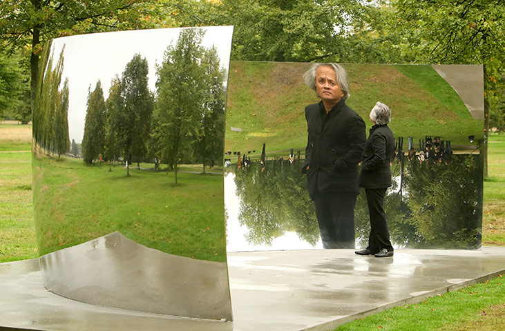 Kapoor: Artist Anish Kapoor is seen reflected in 'C-Curve' 2007