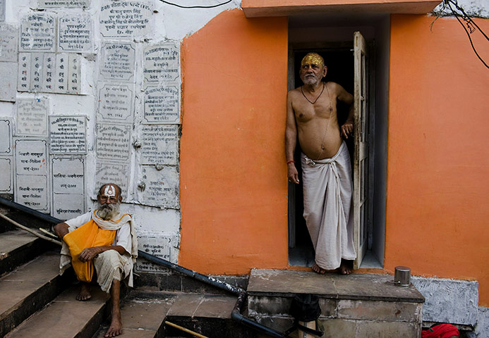 Ayodhya dispute: Indian Hindu holy men outside their residence at a temple in Ayodhya