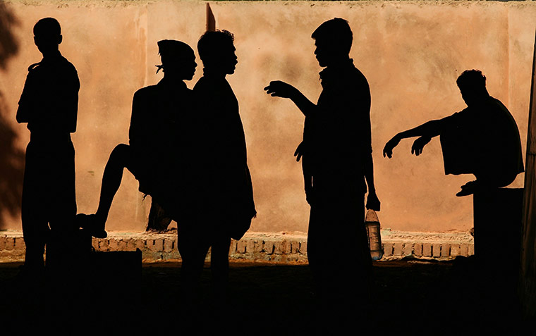 24 hours in pictures: Delhi, India: Workers rest outside the Jawaharlal Nehru Stadium