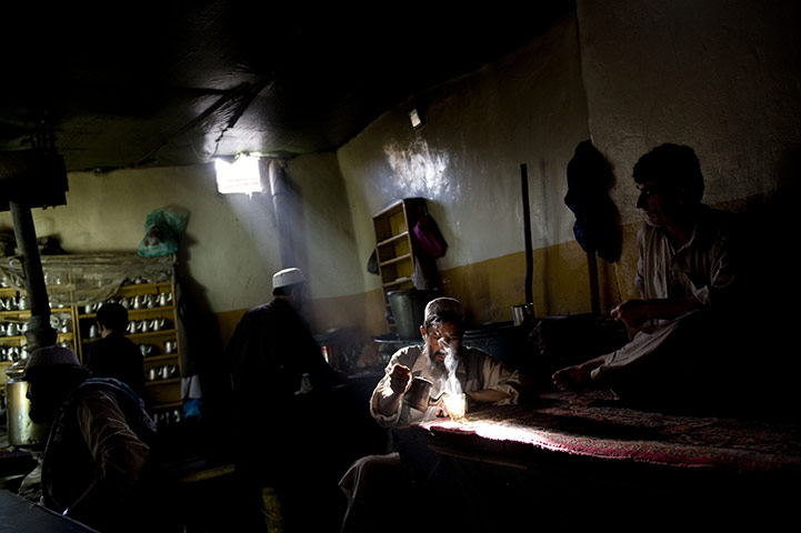 24 hours in pictures: Kabul, Afghanistan: Local men gather in a tea shop
